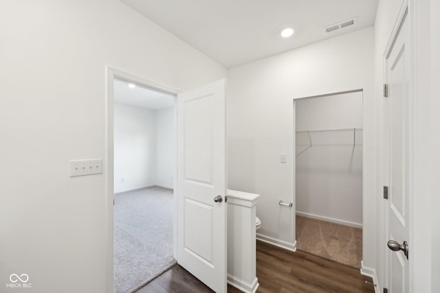 10126 Camp Creek Way, Indianapolis, IN 46229 - hallway with dark wood-type flooring and recessed lighting