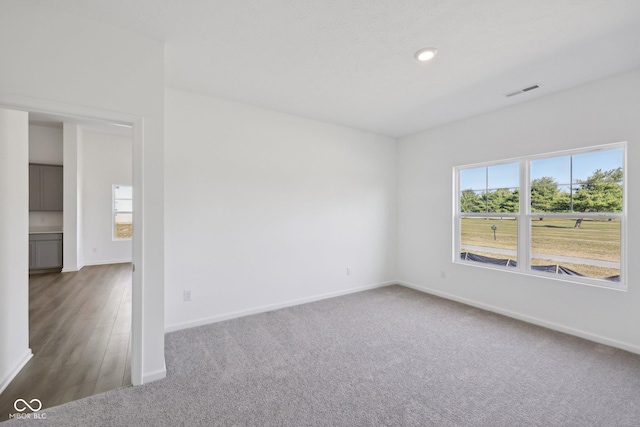 10126 Camp Creek Way, Indianapolis, IN 46229 - empty room featuring carpet flooring and recessed lighting