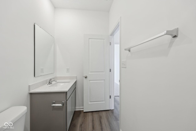 10126 Camp Creek Way, Indianapolis, IN 46229 - half bath featuring vanity and wood finished floors