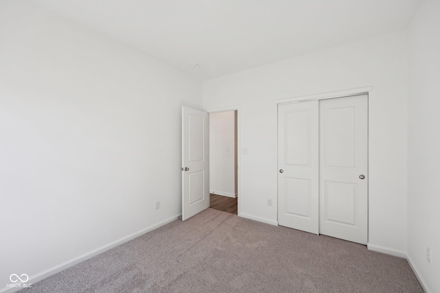 10126 Camp Creek Way, Indianapolis, IN 46229 - unfurnished bedroom with carpet floors and a closet