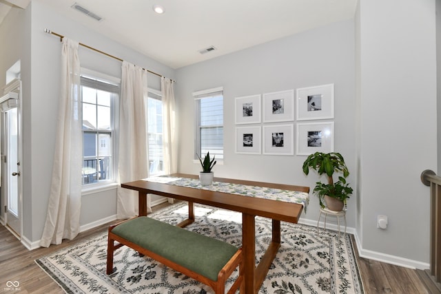 office featuring recessed lighting, wood finished floors, visible vents, and baseboards