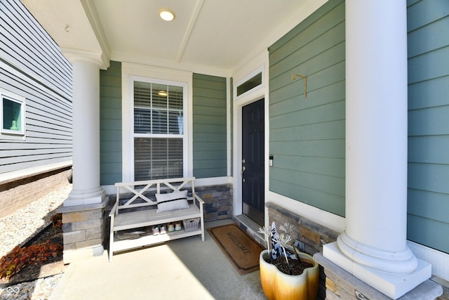 doorway to property with covered porch