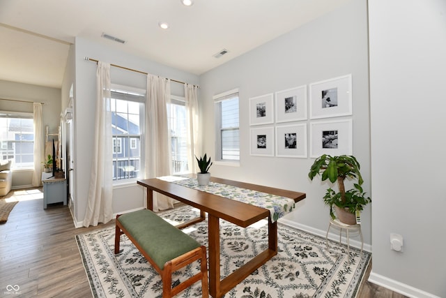 office area featuring visible vents, a healthy amount of sunlight, and light wood-style flooring