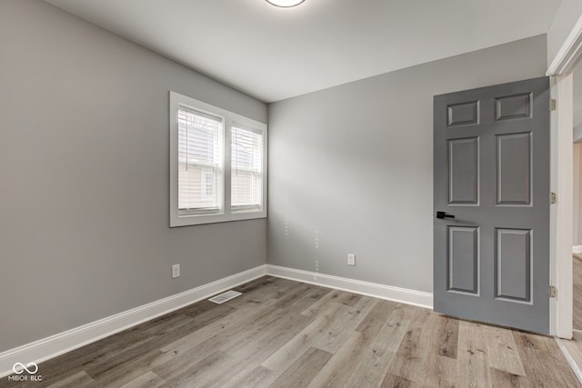 301 Villa Ave, Indianapolis, IN 46201 - empty room with visible vents, baseboards, and wood finished floors