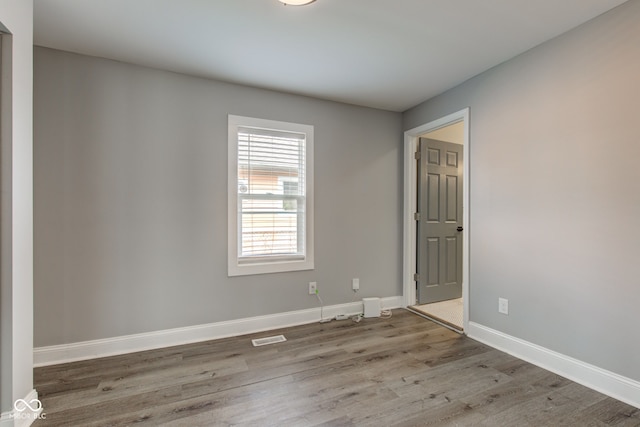 301 Villa Ave, Indianapolis, IN 46201 - spare room with visible vents, baseboards, and wood finished floors