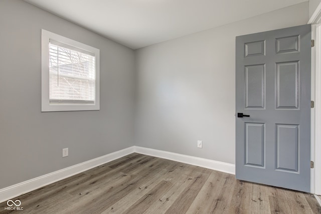 301 Villa Ave, Indianapolis, IN 46201 - spare room featuring baseboards and wood finished floors