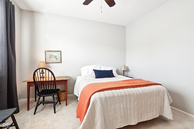 bedroom with carpet flooring, baseboards, and ceiling fan