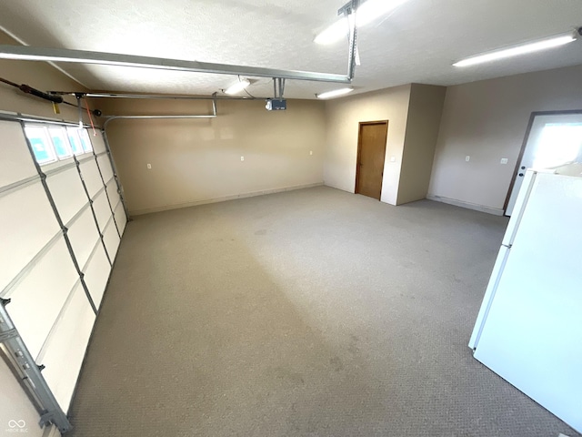 garage featuring freestanding refrigerator