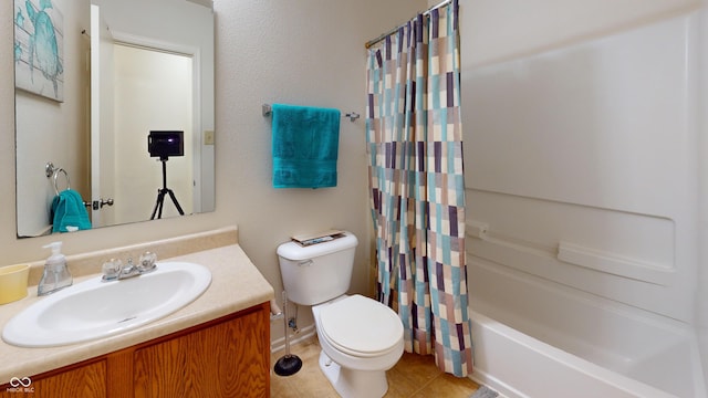 7853 Wildwood Farms Ln, Indianapolis, IN 46239 - full bathroom featuring vanity, tile patterned flooring, and shower / bath combo with shower curtain