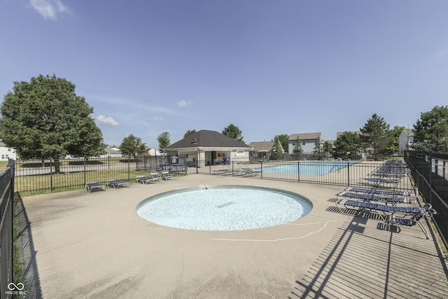 7853 Wildwood Farms Ln, Indianapolis, IN 46239 - community pool featuring a patio