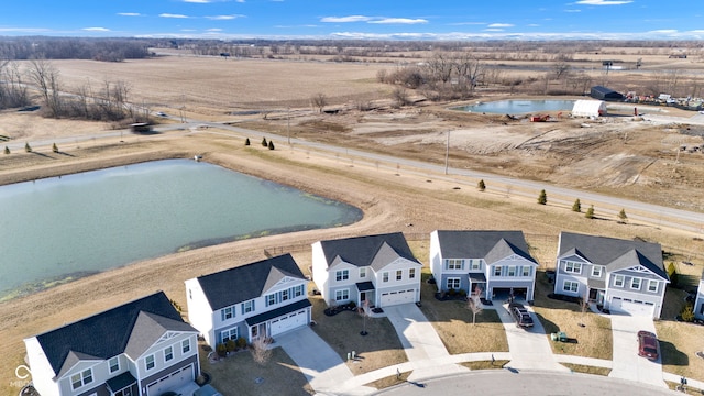 aerial view with a residential view and a water view