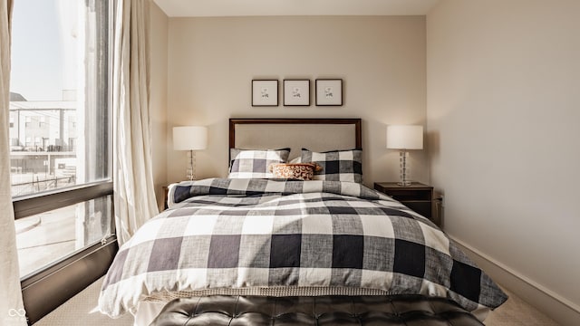 bedroom featuring baseboards