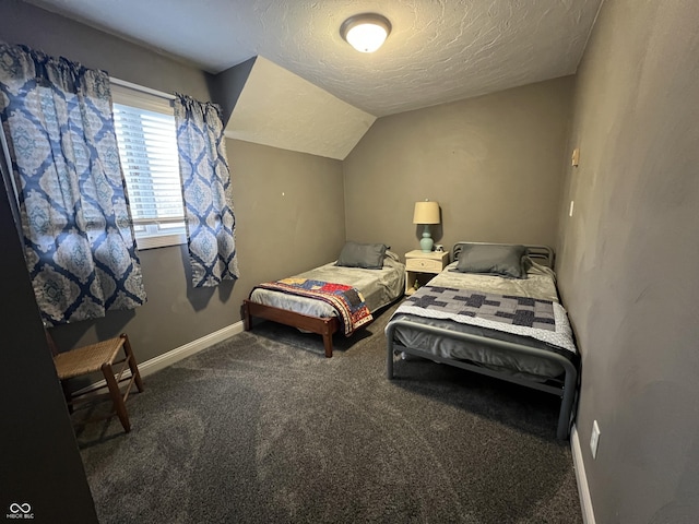 bedroom featuring a textured ceiling, lofted ceiling, baseboards, and carpet floors