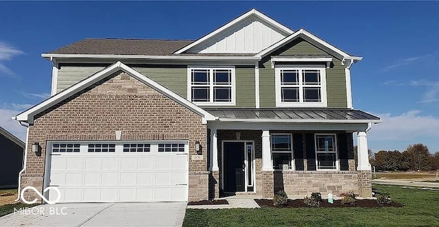 view of front of home featuring a standing seam roof, a porch, board and batten siding, concrete driveway, and brick siding