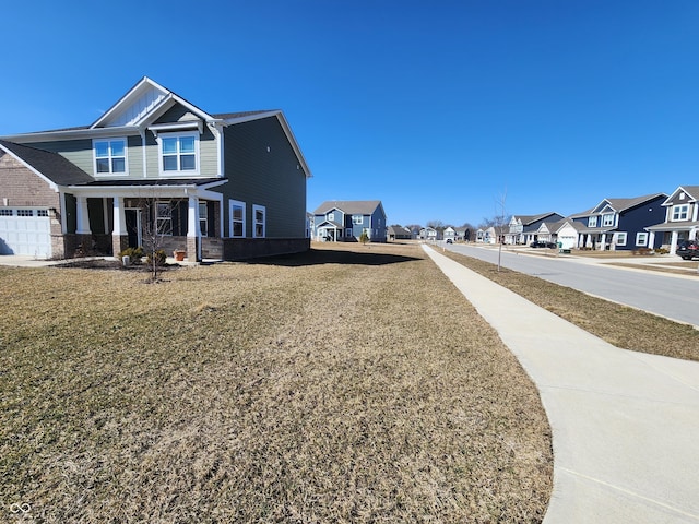 exterior space featuring sidewalks and a residential view