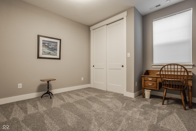 home office featuring visible vents, baseboards, and carpet