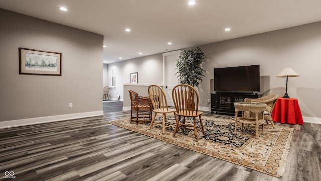 dining room featuring recessed lighting, baseboards, and wood finished floors