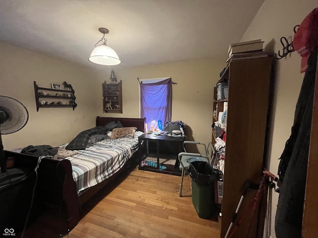 bedroom featuring light wood finished floors