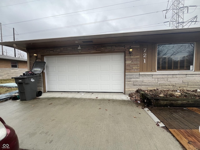 garage featuring driveway