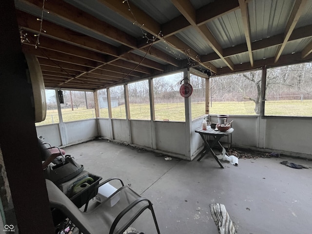 unfurnished sunroom with a healthy amount of sunlight