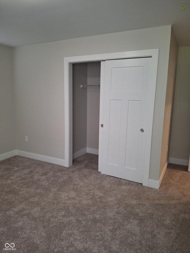 1974 Ralston Ave, Indianapolis, IN 46218 - unfurnished bedroom featuring carpet and a closet