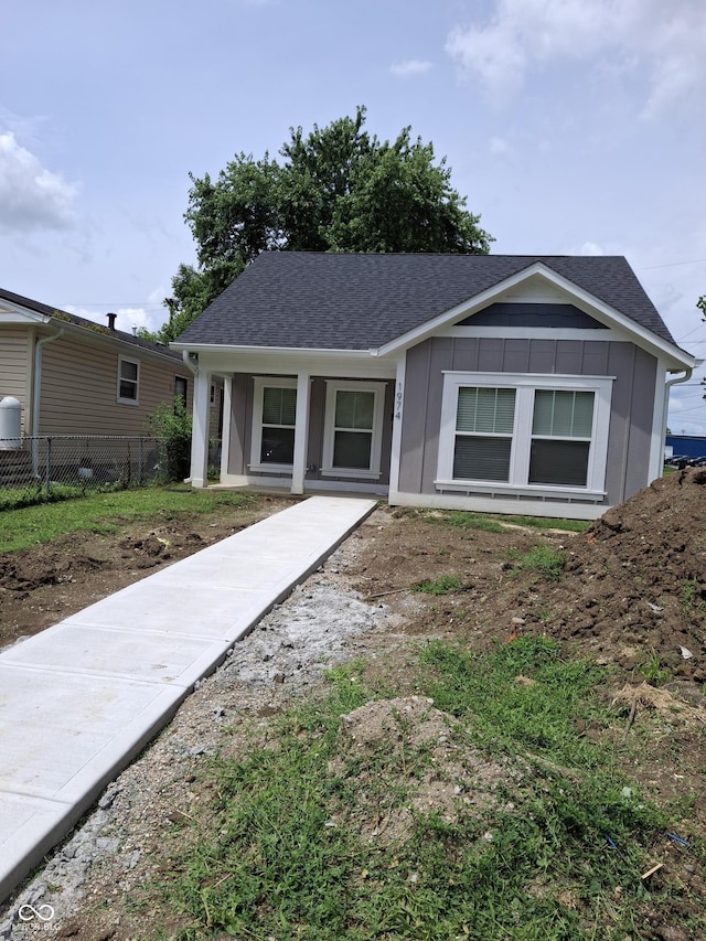 1974 Ralston Ave, Indianapolis, IN 46218 - single story home with board and batten siding and roof with shingles