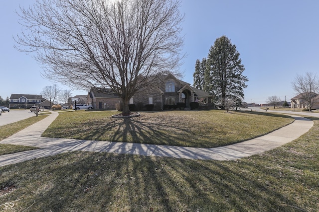 view of front of house with a front lawn