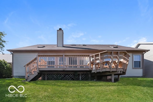 rear view of property featuring crawl space, a yard, a wooden deck, and a chimney