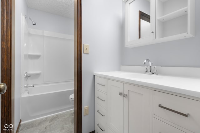 full bathroom featuring vanity, toilet, bathtub / shower combination, and a textured ceiling