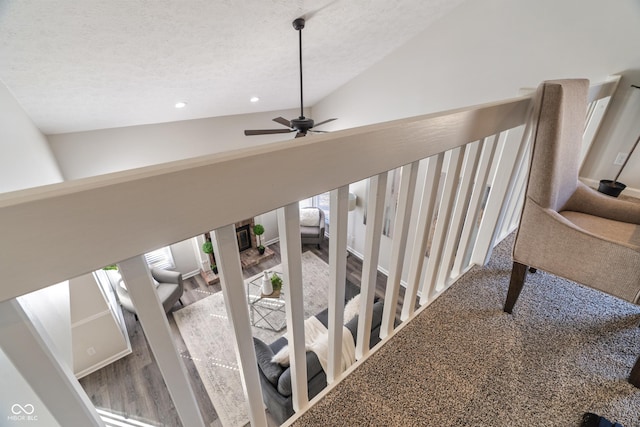 stairs featuring high vaulted ceiling, recessed lighting, a textured ceiling, and a ceiling fan