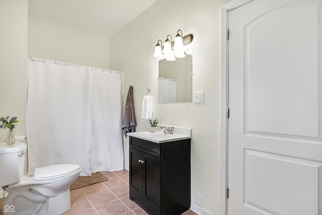 full bathroom featuring tile patterned flooring, toilet, and vanity