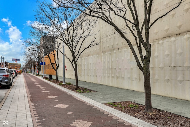 view of road featuring sidewalks and curbs