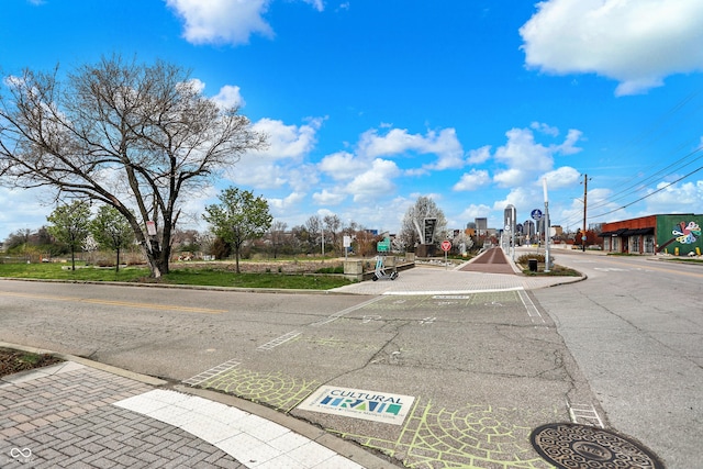 view of road with curbs