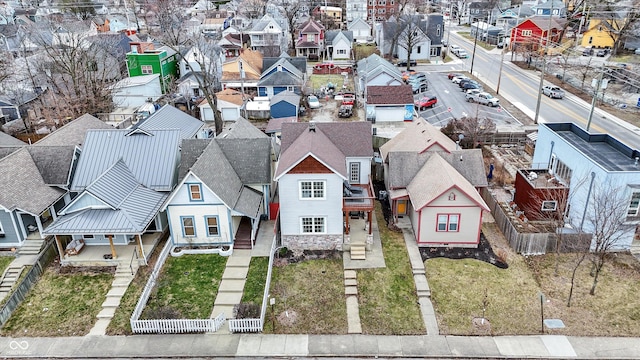 birds eye view of property with a residential view