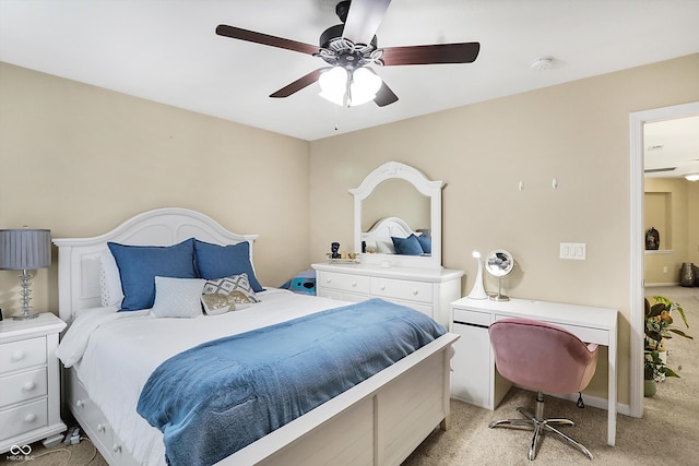 bedroom with light carpet and ceiling fan