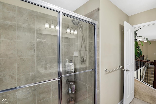 full bathroom with a shower stall