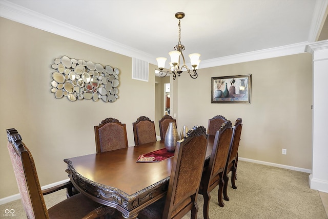 dining room featuring light carpet, an inviting chandelier, baseboards, and ornamental molding