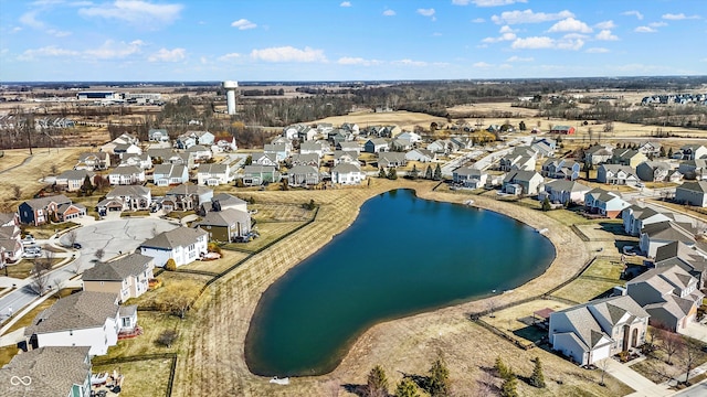 drone / aerial view with a residential view and a water view