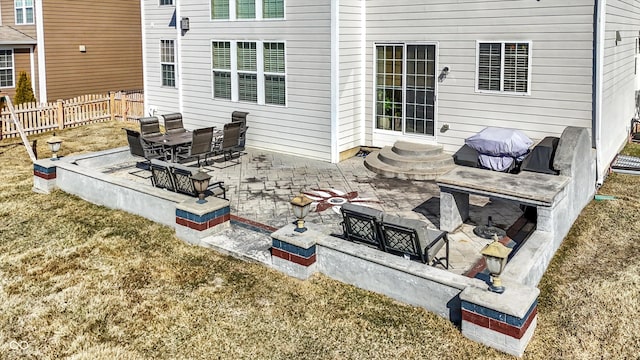 view of patio / terrace with entry steps and fence