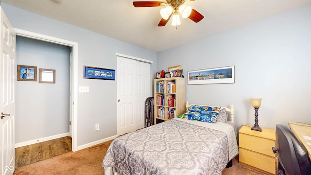 bedroom with baseboards, a closet, carpet floors, and ceiling fan