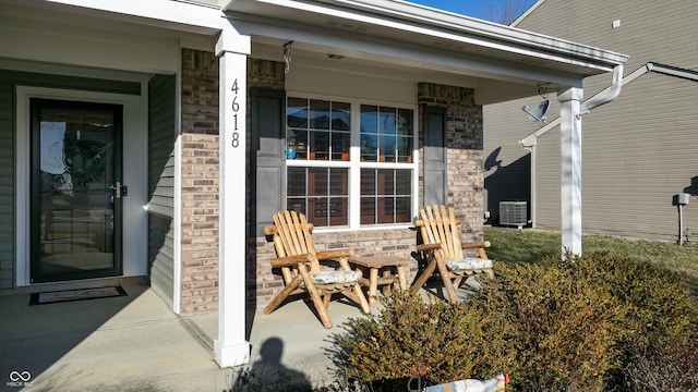 view of patio / terrace featuring cooling unit and covered porch