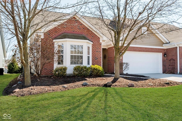 single story home with brick siding, an attached garage, concrete driveway, and a front yard