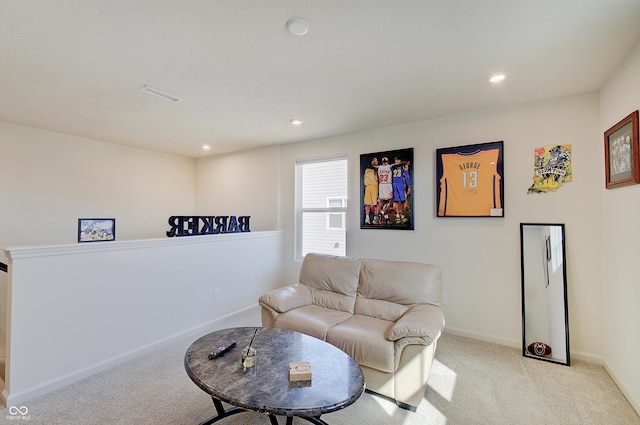 living area featuring recessed lighting, visible vents, light carpet, and baseboards