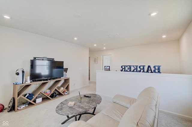 carpeted living room with recessed lighting, visible vents, and baseboards