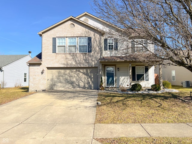 traditional home featuring brick siding, an attached garage, a front lawn, central air condition unit, and driveway