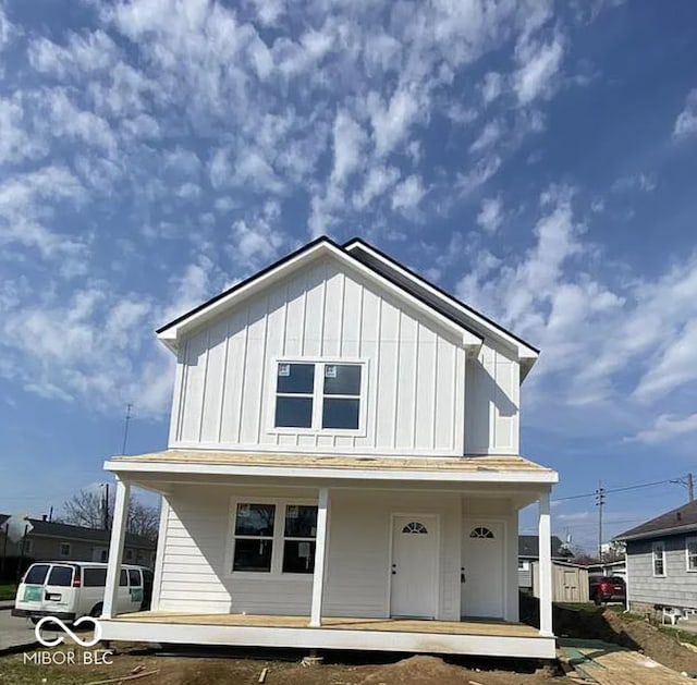 view of front of home with a porch and board and batten siding