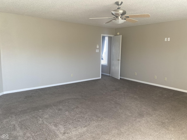 spare room featuring a textured ceiling, baseboards, and a ceiling fan