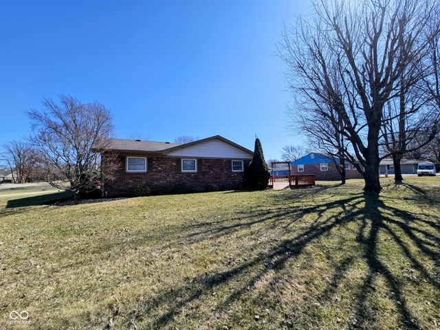 4109 E Epler Ave, Indianapolis, IN 46237 - view of property exterior with brick siding and a lawn