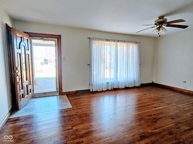 4109 E Epler Ave, Indianapolis, IN 46237 - foyer with wood finished floors, baseboards, and a healthy amount of sunlight