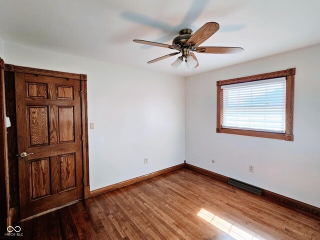 4109 E Epler Ave, Indianapolis, IN 46237 - spare room with ceiling fan, wood finished floors, visible vents, and baseboards